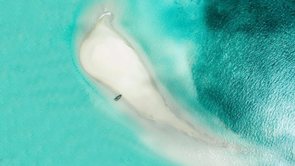 Aerial view of Nakupenda Sandbank near Zanzibar’s coast, surrounded by turquoise waters
