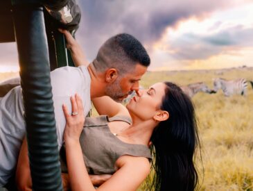 Couple on honeymoon in Tanzania enjoying a safari